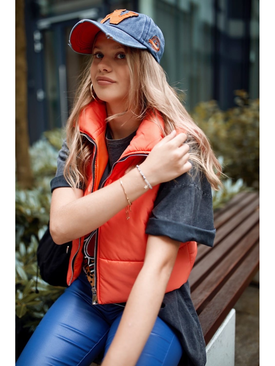 Short quilted vest with a stand-up collar, neon orange 999230 - Online store - Boutique